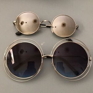 Bundle of 2 pairs of tinted round metal frame sunglasses.